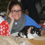 Kate with her tuxedo cat, Sam — testimonial for Alana Stevenson's cat behavior training for biting, scratching, and play aggression in North Carolina
